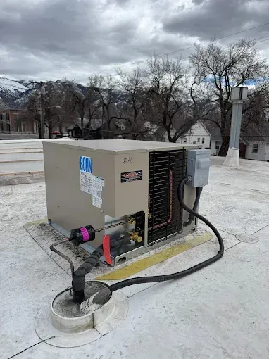 Rooftop AC unit installation in Logan, UT